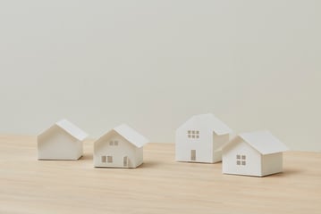 Waarom vastgoed een veilige investering blijft in onzekere tijden